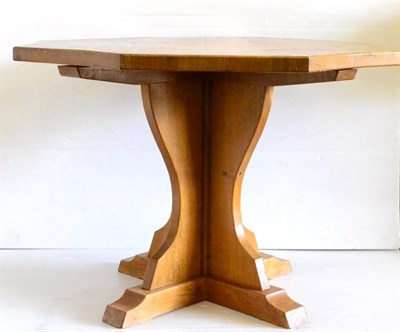 Lot 606 - A Sid Pollard Oak Octagonal Dining Table, on a cruciform base, 113cm diameter, 75.5cm high