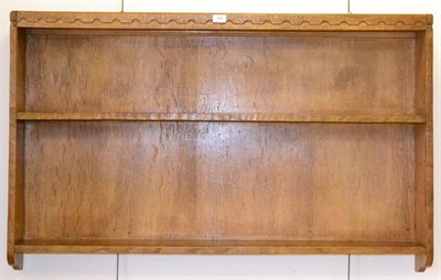 Lot 608 - A Sid Pollard Oak Open Hanging Rack, with castellated top, fixed shelf, 121cm wide, 15cm deep,...