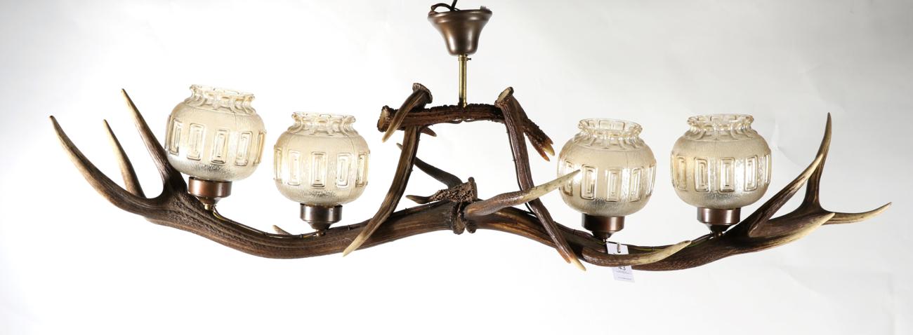 Lot 43 - Antler: An Austro-German Red Deer Antler Ceiling Light Fitting, constructed from two Red Deer...