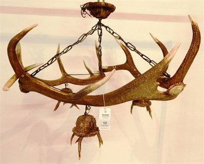Lot 10 - Taxidermy: An Austro-German Red Deer Antler Mounted Chandelier, constructed from three shed antlers