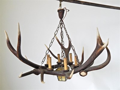 Lot 153 - An Austro-German Red Deer Antler Chandelier, constructed from three Red Deer antlers fitted...