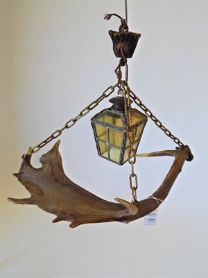 Lot 154 - Two Fallow Deer Antler Mounted Hanging Ceiling Lights, one light mounted with a leaded amber...