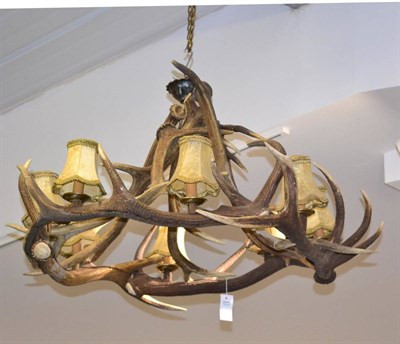 Lot 182 - Red Deer (Cervus elaphus), eight-light chandelier constructed from ten cast antlers (47 points...