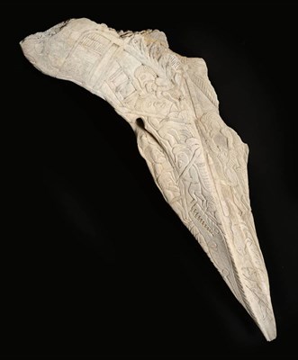 Lot 196 - Sperm Whale (Physeter macrocephalus), circa 1920, portion of a skull heavily carved by...