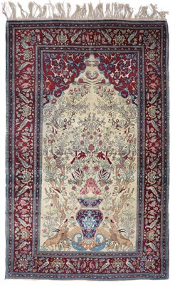 Lot 901 - Fine Isfahan Prayer Rug Central Iran The cream ground with an urn issuing flowers flanked by trees