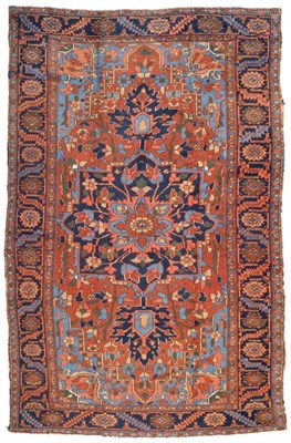 Lot 903 - Heriz Carpet Persian Azerbaijan, circa 1910 The terracotta field of angular vines around an...