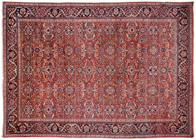 Lot 916 - Mahal Carpet of large size West Iran The madder field with an allover design of large...