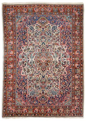 Lot 926 - Mahal Carpet West Persia The ivory field of flowering vines around a cusped medallion enclosed...