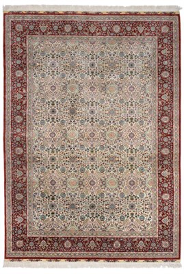 Lot 927 - Fine Hereke Design Silk Rug The ivory field with an allover design of plamettes and scrolling vines