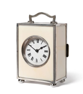 Lot 934 - A Silver and Ivory Carriage Timepiece, 1925, carrying handle, plain ivory panels, London...