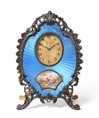 Lot 935 - A White Metal and Blue Enamel Strut Timepiece, retailed Wegelin, Geneve, circa 1910, scroll and...