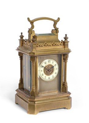 Lot 948 - A Small Gothic Style Brass Carriage Timepiece, circa 1900, carrying handle, turned finials and...