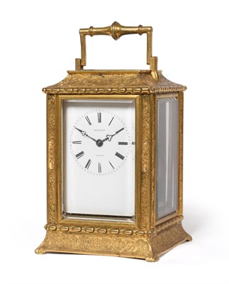 Lot 950 - A Brass Engraved Striking Carriage Clock, signed Potonie, Paris, circa 1858, the elaborately scroll