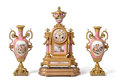 Lot 958 - An Ormolu and Porcelain Mounted Striking Mantel Clock with Garniture, circa 1880, urn finial,...