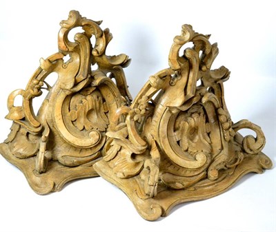 Lot 1032 - A Pair of Carved Wood Wall Brackets, 19th century, in Rococo style, carved with scrolls and...