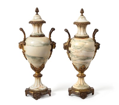 Lot 1037 - A Pair of Gilt Metal Mounted Marble Urns and Covers, circa 1900, of baluster form with mask handles