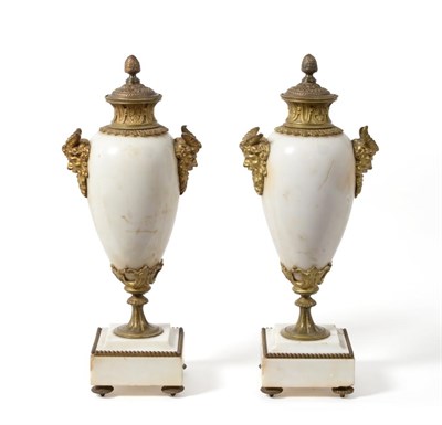 Lot 1038 - A Pair of Gilt Metal Mounted White Marble Urns and Covers, of baluster form with Bacchus mask...