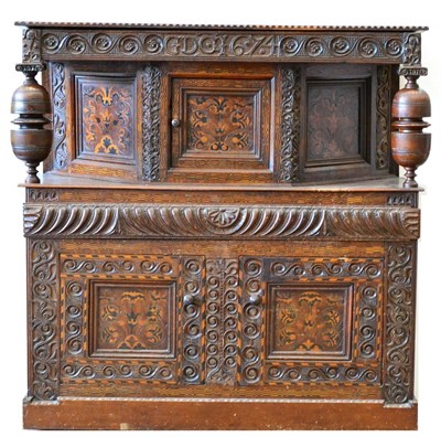 Lot 1057 - A Carved Oak and Marquetry Inlaid Court Cupboard, carved with initials GDC and dated 1674, the...