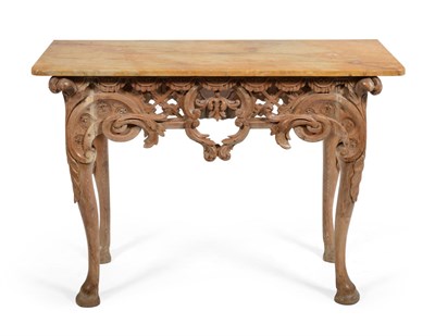 Lot 1080 - A Carved Pine Side Table, in George I style, the yellow Sienna marble top above an acanthus and...