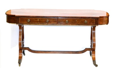 Lot 1084 - A Regency Rosewood and Satinwood Banded Library Table, early 19th century, of rounded...