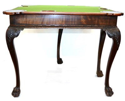 Lot 1090 - A Mid 18th Century Mahogany Foldover Games Table, with hinged lid and eared corners revealing a...