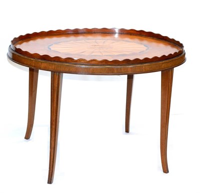 Lot 1110 - A Mahogany, Satinwood, Rosewood, Boxwood and Ebony Strung Oval Occasional Table, the shaped gallery