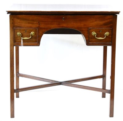 Lot 1123 - A Late George III Mahogany Kneehole Writing or Dressing Table, early 19th century, the hinged...