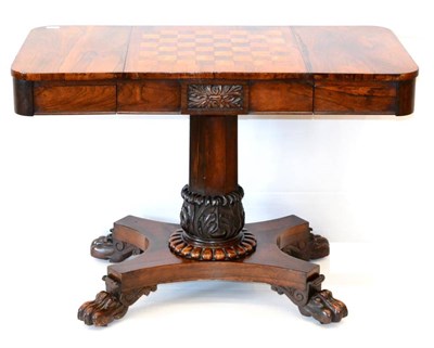 Lot 1129 - A William IV Rosewood Chess Top Pedestal Table, circa 1837, the centre section sliding to...