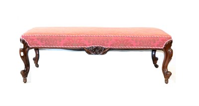 Lot 1134 - An Early Victorian Rosewood Framed Oversized Stool, mid 19th century, recovered in pink floral...