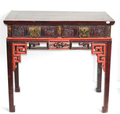 Lot 1143 - A Chinese Softwood and Red Painted Two Drawer Side Table, the cleated top above a floral...