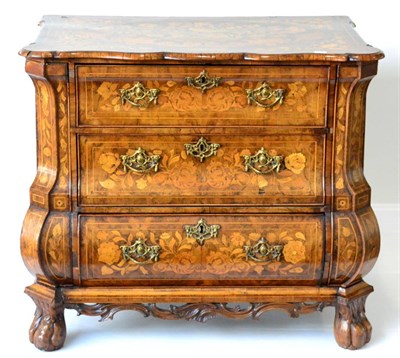 Lot 1149 - A Dutch Walnut and Floral Marquetry Inlaid Chest of Drawers, richly decorated with flowers and...