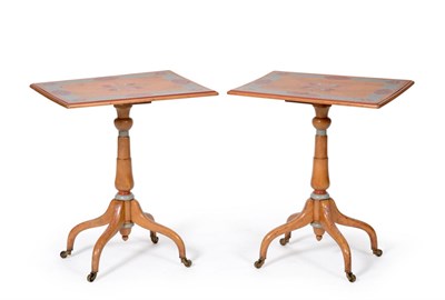 Lot 1192 - A Pair of 19th Century Satinwood and Painted Tripod Tables, the rectangular tops decorated with...