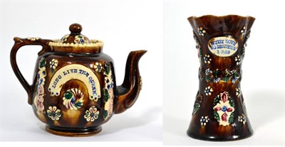 Lot 63 - A Measham Bargeware Teapot and Cover, dated 1887, of ovoid form, inscribed JUBILEE 1887, the...