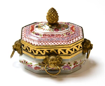 Lot 80 - A Meissen Porcelain Sugar Box and Cover, circa 1735, painted in Imari type colours with chinoiserie