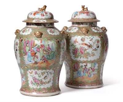 Lot 108 - A Pair of Cantonese Porcelain Baluster Jars and Covers, mid 19th century, with fo dog knops and...
