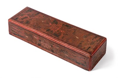 Lot 124 - A Chinese Lacquer Scribe's Box and Cover, bears Kangxi reign mark, of rectangular form,...