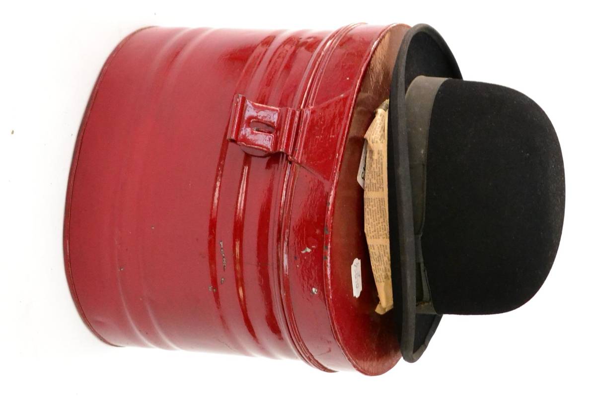 Lot 2043 - A Childs Hunting Bowler Hat and Leather Gloves, hat by Moss Bros, in a red painted tin hatbox