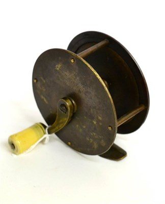 Lot 2079 - A 19th Century 3 1/2inch Brass Winch by Chas Farlow, London, with ivorine handle on curved...