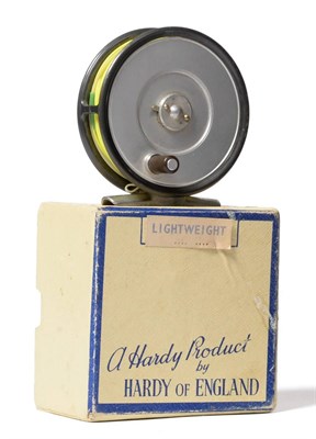 Lot 2116 - A Hardy 3 1/8inch Alloy 'Lightweight' Fly Reel, with black handle on solid drum, alloy foot,...