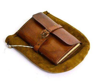 Lot 2131 - A Hardy Brothers Leather Fly Wallet, containing a selection of salmon and trout flies