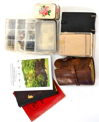 Lot 2136 - A Leather Fly Wallet with Flies, together with Jim Wynn's fly book 'Recommended Flies of the...
