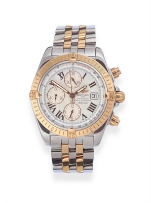 Lot 184 - A Steel and Gold Automatic Calendar Chronograph Wristwatch, signed Breitling, Chronographe Certifie