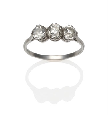 Lot 200 - An Early 20th Century Diamond Three Stone Ring, the old cut diamonds in white claw settings, to...