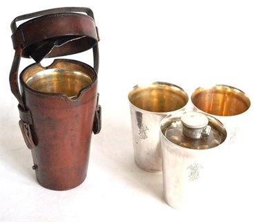 Lot 2037 - A Hunting Drinks Set in Stitched Leather Case, comprising a conical glass flask with plated...