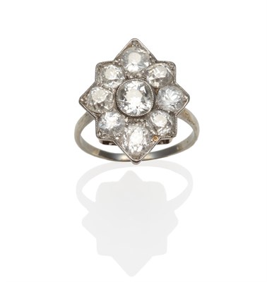 Lot 202 - A Diamond Cluster Ring, circa 1910, an eight-pointed star shaped cluster set throughout with...