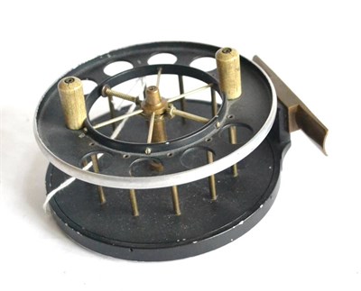 Lot 2062 - An Allcocks 4 1/2inch Alloy 'Aerial' Reel, with twin white handles on spoked drum, brass foot,...