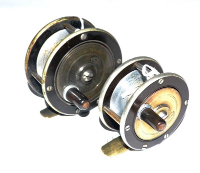 Lot 2075 - Two A.W.Gamages Brass Faced Ebonite Trout Fly Reels - 2 3/4inch and 2 1/4inch, both with horn...