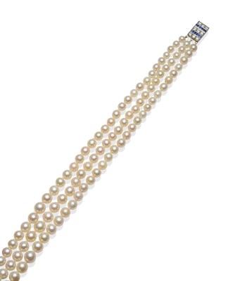 Lot 205 - A Three Row Cultured Pearl Necklace, the graduated rows of 49:51:56 cultured pearls knotted to...