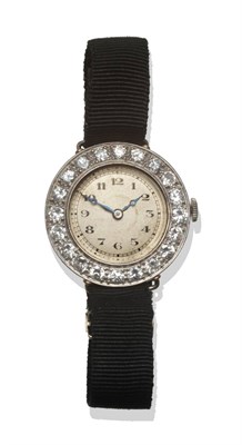 Lot 209 - A Lady's Diamond Set Wristwatch, lever movement, silvered dial, black Arabic numerals, and...