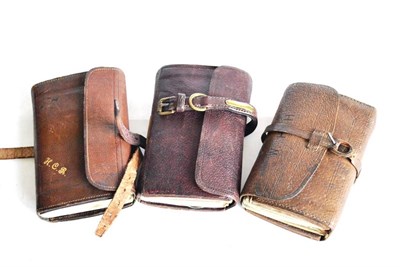 Lot 2129 - Three Small Stitched Leather Fly Wallets, all with leather straps, one by Farlows of London,...